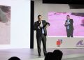 Enmanuel Cedeño, destaca la baja morosidad del sector turístico durante su participación en un foro sobre banca y turismo.