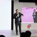 Enmanuel Cedeño, destaca la baja morosidad del sector turístico durante su participación en un foro sobre banca y turismo.