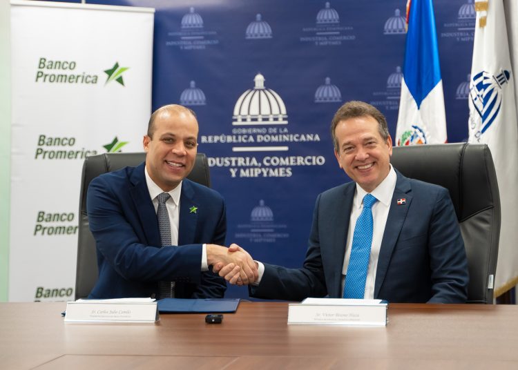 Carlos Julio Camilo y Víctor (Ito) Bisonó.