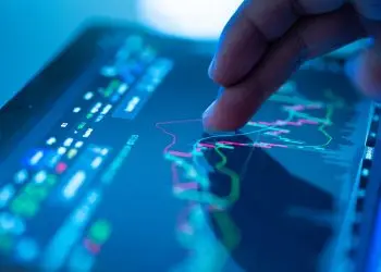 Businessman checking stock market data