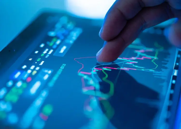 Businessman checking stock market data