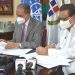 Franklin García Fermín y Miguel Fiallo Calderón, durante la firma de acuerdo