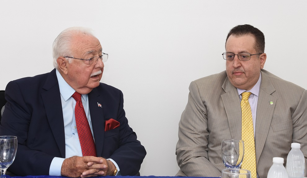 el ministro antonio isa conde y el director de dgii, magín díaz