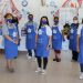 El chef Osvaldo Valerio, Elena Nunziatini, Karla Rojas y Luisa Féliz en compañía de voluntarios.