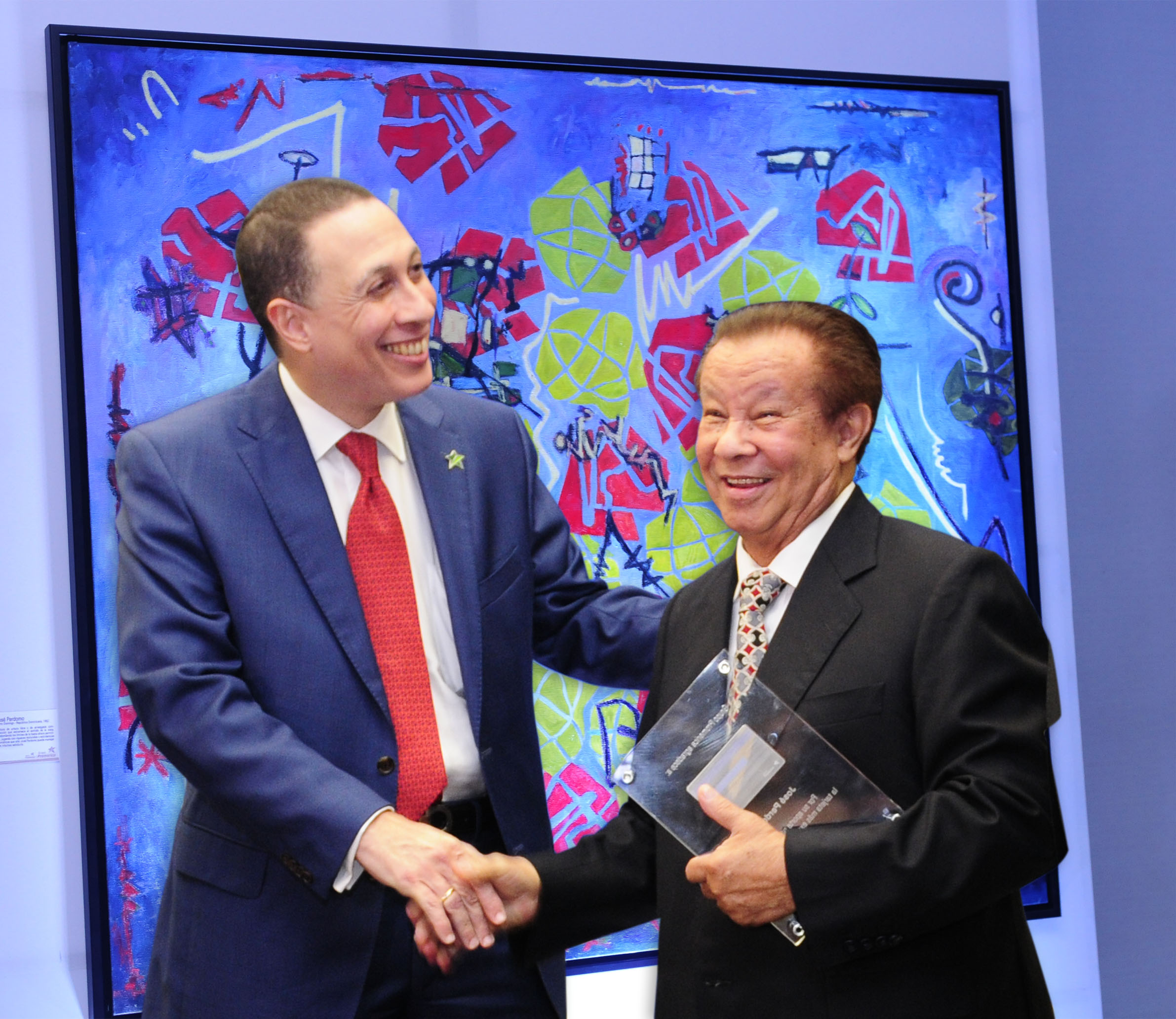 hampton castillo, presidente de promérica, y josé perdomo.