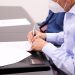 El ministro de Industria, Comercio y Mipymes (MICM), Víctor Bisonó, firmando el memorando de entendimiento. | Fuente externa.