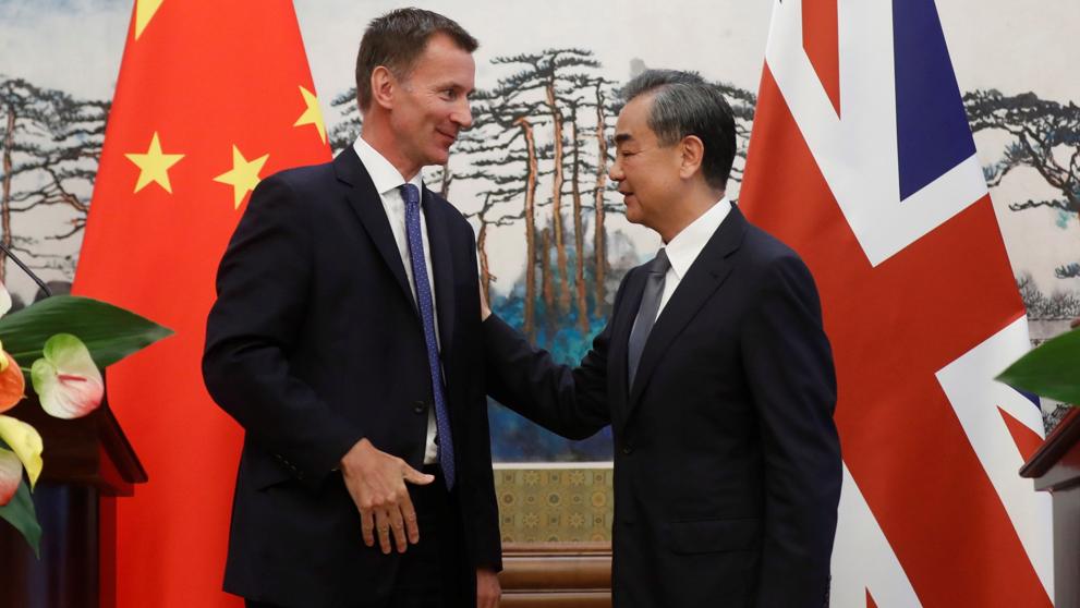 jeremy hunt y wang yi