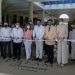 Ministro de Turismo junto a ejecutivos de AMResorts en corte de cinta por reapertura.