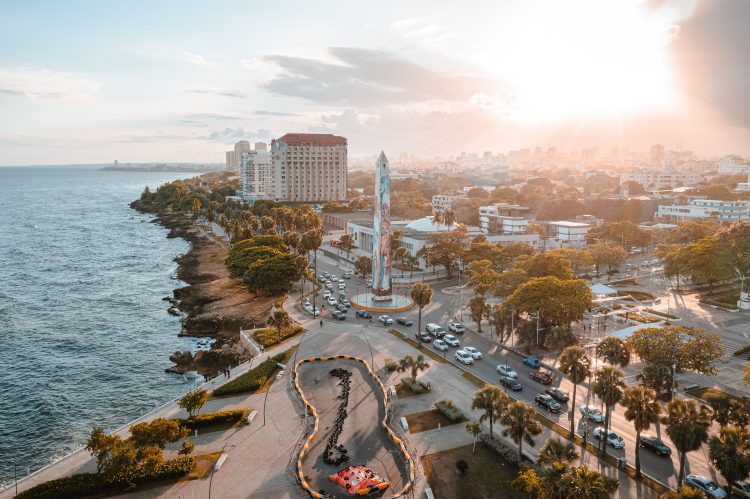Santo Domingo, Dominican Republic – April 30, 2021: An aerial view of an obelisk during sunset in the Malecon of Santo Domingo, Dominican Republic