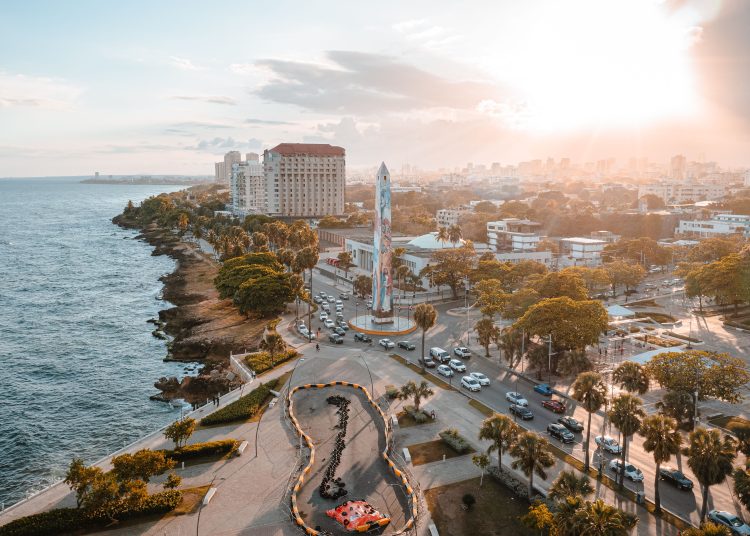 Santo Domingo, Dominican Republic – April 30, 2021: An aerial view of an obelisk during sunset in the Malecon of Santo Domingo, Dominican Republic