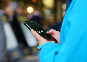 Birmingham,,Uk,-,October,13,,2018:,Person,Using,The,Uber