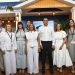 Equipo de Negocios Turísticos del Banco de Reservas junto al ministro David Collado y funcionarios del Ministerio de Turismo en la feria DATE 2026.