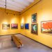 La muestra reúne obras de 18 artistas dominicanos sobre identidad y paisaje.