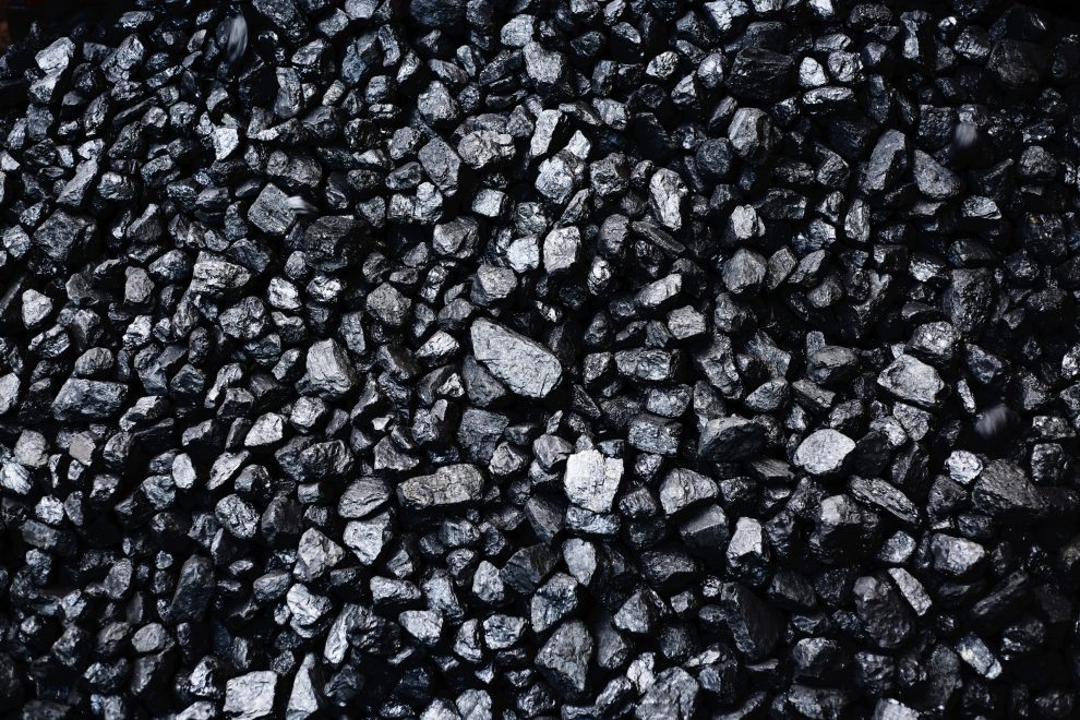 black money, coal background texture fossil fuel winter stock