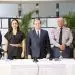 En compañía de Paliza se encuentra la ministra de Interior y Policía, Faride Raful; el director de la Policía Nacional, mayor general, Ramón Antonio Guzmán Peralta; el viceministro de Defensa para Asuntos Militares, el Mayor General Miguel Ángel Rubio Báez, entre otros funcionarios.