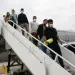 Los migrantes fueron recibidos por una delegación de la Presidencia, el Ministerio de Relaciones Exteriores, la FAC, Migración Colombia, el Instituto Colombiano de Bienestar Familiar (ICBF), la Alcaldía de Bogotá y la Cruz Roja.